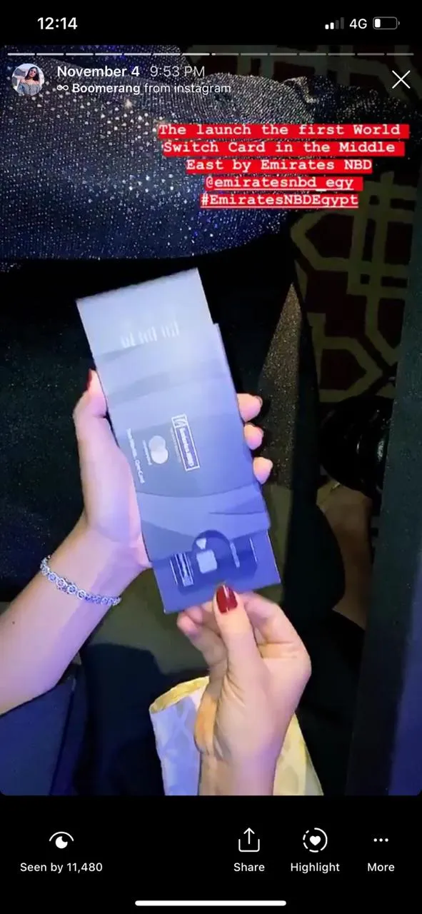 Celebrity unboxing the World Switch Card at the launch event